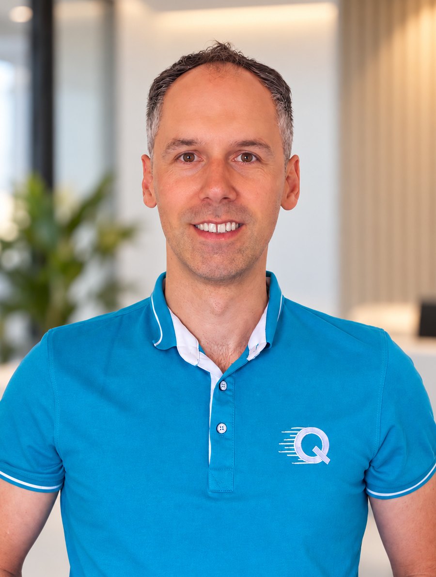 Sonny Rolih, Managing Director of Quick Replace, wearing a blue Quick Replace polo shirt