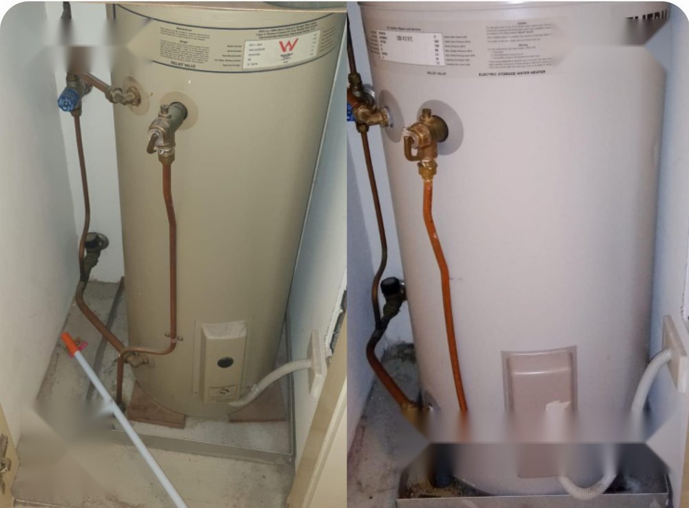 Old corroded hot water unit beside the new replacement unit