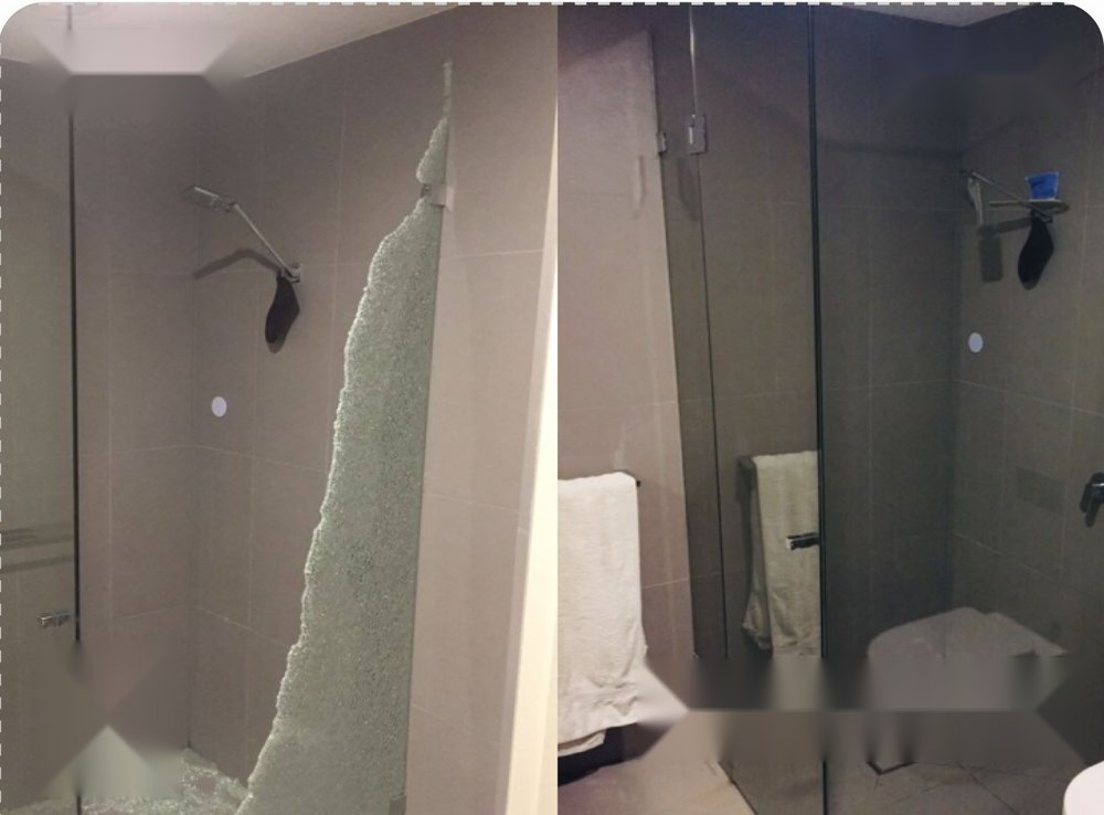Shattered shower screen beside the new glass screen