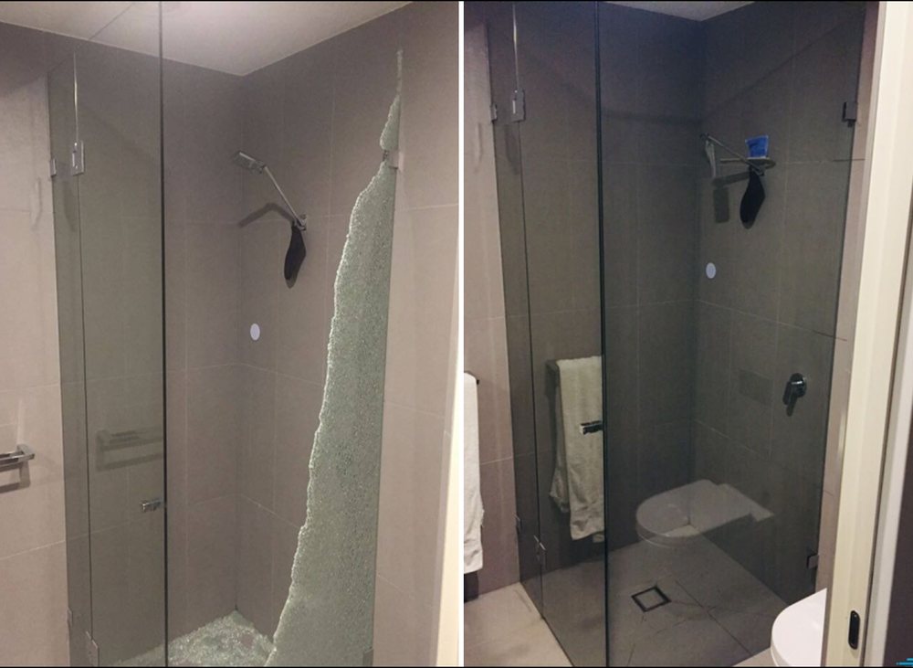 Shattered shower screen beside the new glass screen