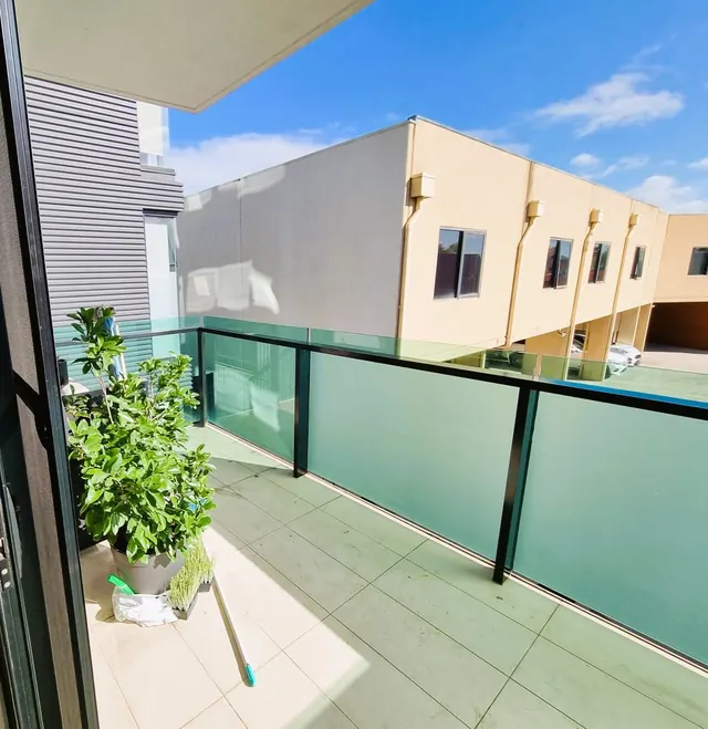 Apartment balcony with frosted glass balustrade panels