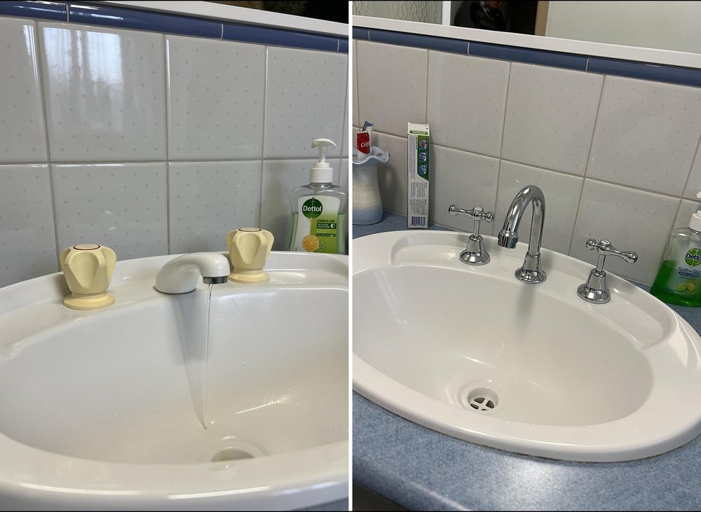 Old bathroom basin taps beside the new mixer tap