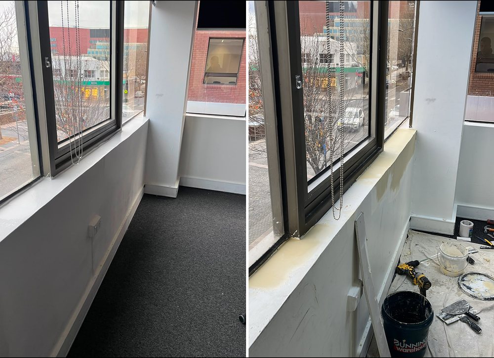 Damaged wall below an office window beside the repaired wall during finishing